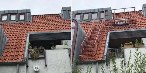 Rote Metalltreppe führt zu einem Dachfenster. Dies ist der 2. Rettungsweg für das Einfamilienhaus.
