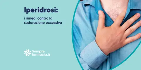 Uomo con camicia bagnata di sudore, che indica iperidrosi. Scopri i rimedi per la sudorazione eccessiva e i farmaci che la provocano.