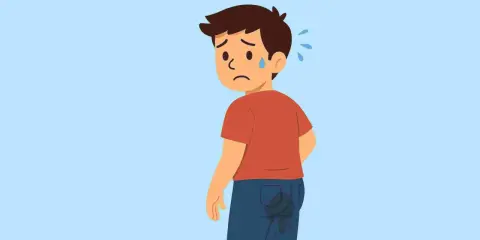 Ragazzo sudato con macchie sui jeans, preoccupato per il prurito tra le natiche. Rimedi urgenti!
