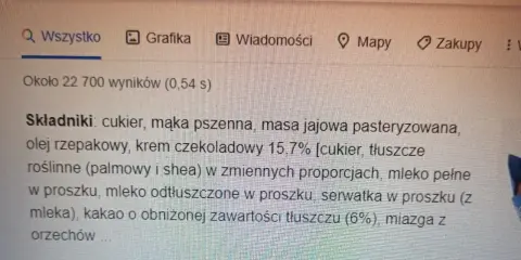 Szukasz informacji, ile kcal ma babeczka Wedel? Na ekranie widać składniki tej słodkości: cukier, mąka, krem czekoladowy.