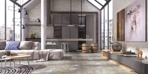 Nowoczesny salon z industrialnymi akcentami. Na podłodze piękne, wzorzyste płytki, które dodają charakteru.