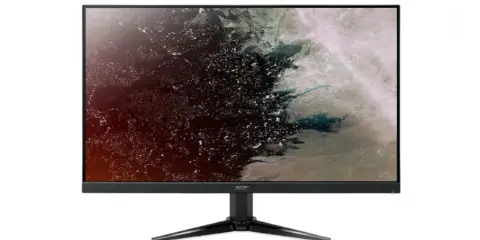 Écran Acer 24 pouces affichant une image abstraite aux teintes sombres et claires, évoquant une nébuleuse ou une carte terrestre vue du ciel.