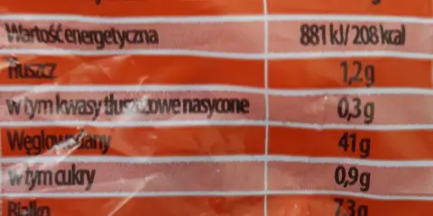 Tabela wartości odżywczych dla chleba baltonowskiego: 881 kJ/208 kcal, 1,2g tłuszczu, 41g węglowodanów, 7,3g białka.