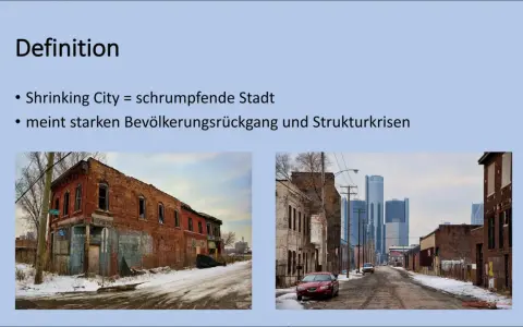 Verfallene Gebäude und moderne Skyline in Detroit spiegeln die Herausforderungen der Detroit Stadtentwicklung wider.