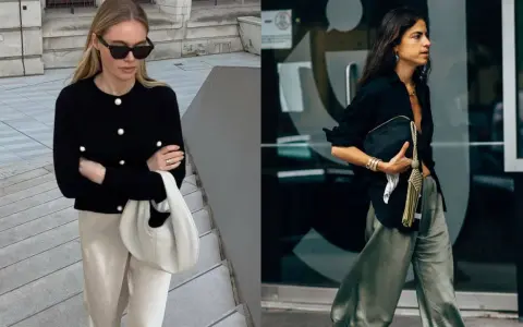 Dos mujeres lucen ropa de ricos: una con cárdigan negro y pantalón beige, la otra con camisa negra y pantalón verde.