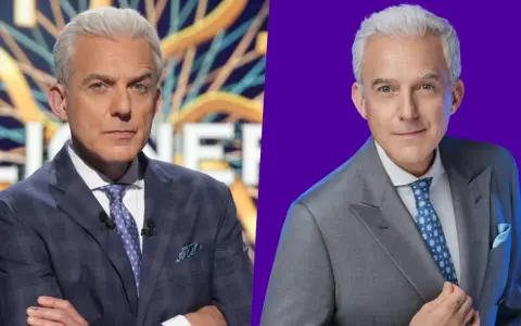 Hubert Urbański w garniturze, prowadzący "Milionerzy TVN". Kiedy emisja? Sprawdź na stronie programu!