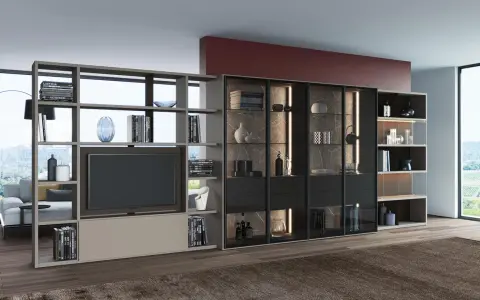 Elegante porta tv girevole design, con libreria componibile e vetrine illuminate, perfetta per un salotto moderno.