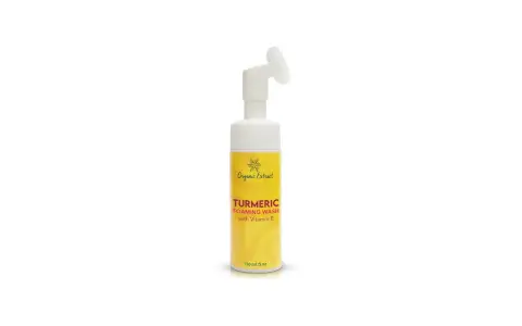 A bottle of Organic Extract Turmeric Foaming Wash with Vitamin E, highlighting its turmeric face wash benefits for radiant skin.