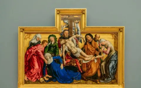A dramatic religious painting, likely from a museum, depicts the descent from the cross with figures in rich robes surrounding a fallen Christ.