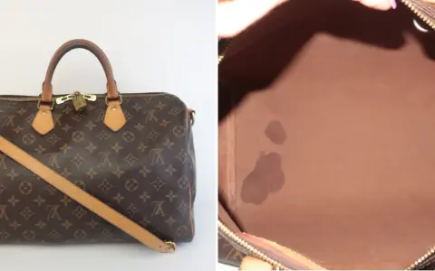 Borsa Louis Vuitton monogram con tracolla e lucchetto. Interno in tela marrone con macchie.