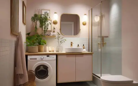 Ein kleines Bad einrichten: Waschmaschine, Waschbecken, Dusche und WC in zarten Rosatönen, mit Pflanzen und goldenen Akzenten.