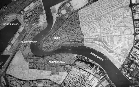Luftaufnahme von Dubai vor 100 Jahren: Deira, Al Bastakiya, Al Shindagha und Port Rashid am Dubai Creek.