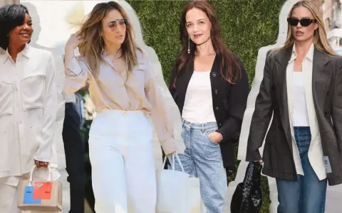 Four women showcase dressy casual looks: a white suit, a silk blouse with white pants, a cardigan with patterned jeans, and a blazer with a white top and jeans.