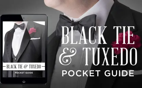 A tablet displays a guide to black tie attire for men, featuring a tuxedo with a bow tie and boutonnière.