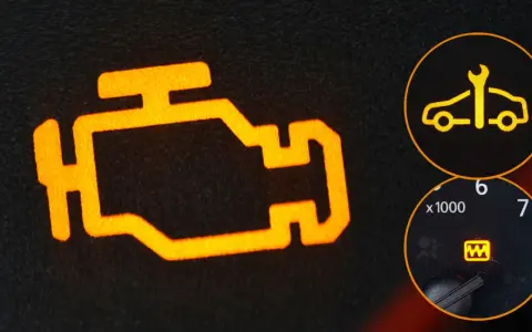 Pomarańczowy symbol check engine świeci się, sugerując problem z silnikiem lub słabe paliwo. Obok kontrolka serwisu i kontrolka ciśnienia w oponach.