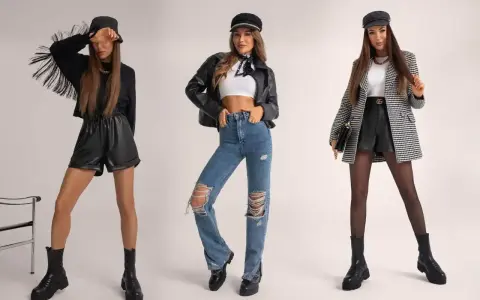 Trzy kobiety w stylizacjach grunge: skórzane szorty, podarte jeansy, ramoneska, marynarka w kratę, czapki i ciężkie buty.