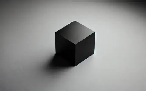 Cubo negro aislado sobre fondo gris, listo para pruebas de caja negra.