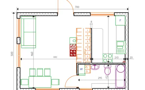 Projekt funkcjonalnego domu 35m2: salon z kanapą, kuchnia, łazienka z wanną i WC, szafy.