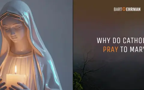 A statue of Mary holds a candle, with text asking "Why do Catholics pray to Mary?