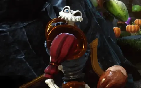 Esqueleto con armadura dorada y roja, listo para la acción en MediEvil PS4.