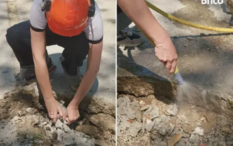 Preparando el área para reparar suelo de hormigón exterior. Se retiran escombros y se humedece la zona.