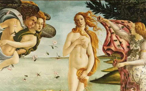 La Venere di Botticelli, nuda su una conchiglia, accolta da Zefiro e Aura, mentre una ninfa le offre un manto fiorito.