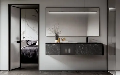 Arredamento moderno per un bagno cieco: mobile sospeso in marmo nero, specchio con illuminazione integrata e porta scorrevole che rivela una camera da letto elegante.