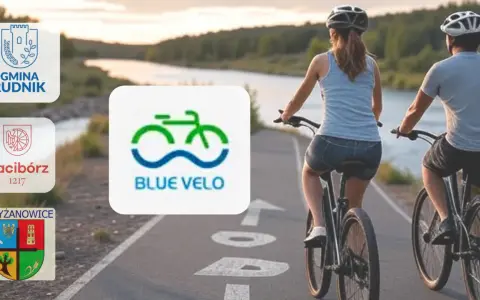 Para rowerzystów na ścieżce nad rzeką, obok logo "BLUE VELO".