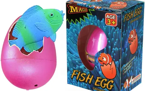 Różowe jajko z wykluwającą się rybką i pudełko zabawki "Fish Egg".