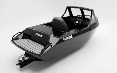 Czarna łódka sportowa F100RZR z kierownicą i siedzeniem. Dowiedz się, jak zarejestrować łódkę, by cieszyć się wodnymi przygodami.
