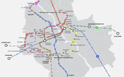 Mapa pokazuje stacje metra M2 i inne linie kolejowe w Warszawie, z zaznaczonymi trasami i nazwami przystanków.