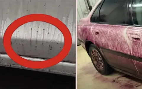 Bilens sida täckt av lila vätska, troligen flygrostborttagare OKQ8, som rinner ner.