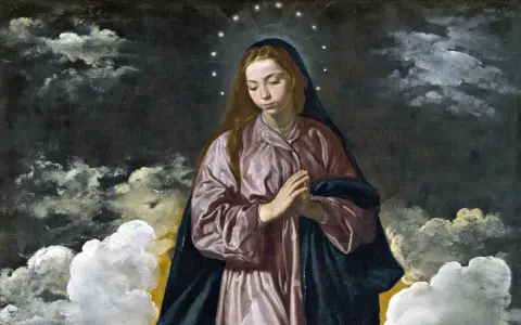 Die Immaculata, umgeben von Wolken und Sternen, verkörpert die reine Gnade. Ihre Hände sind gefaltet, ihr Blick nach unten gerichtet.