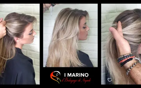 Capelli lunghi con schiariture biondo cenere naturale, un look sofisticato e luminoso.