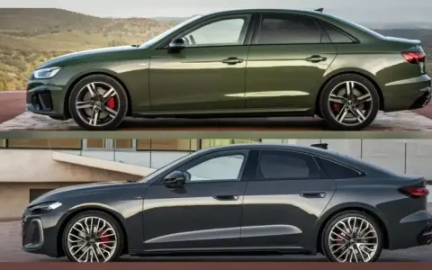Dwa eleganckie sedany Audi: zielony na tle gór i ciemnoszary przy nowoczesnym budynku.