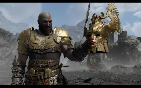 Kratos, el dios de la guerra, sostiene una máscara dorada de valquiria.