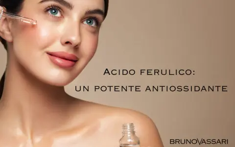 Donna con contagocce applica siero viso. Acido ferulico cos'è? Un potente antiossidante per la pelle.