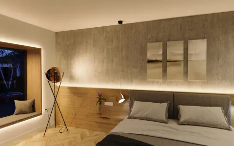 Sovrum med modern belysning, en mysig fönsterplats och konst. Perfekt belysning sovrum inspiration.