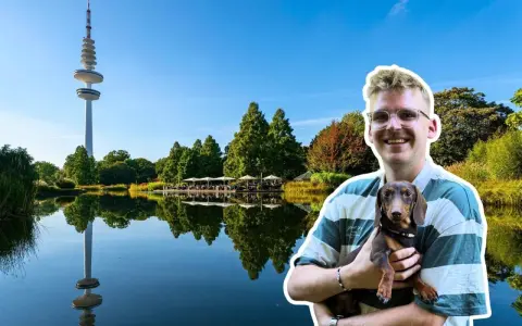 Mann mit Dackel genießt Hamburg umsonst am Wasser, Fernsehturm im Hintergrund.