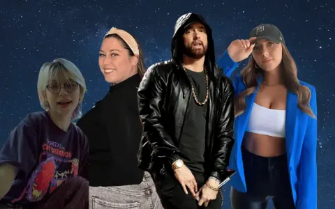 Eminem z córką i innymi osobami na tle gwiazd. Czy Eminem ma dzieci? Tak, ma córkę.