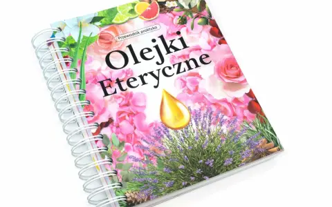 Przewodnik praktyczny "Olejki Eteryczne" z lawendą, różami i kroplą złocistego olejku. Dowiedz się, jak używać olejków eterycznych.