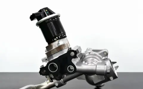 A car's EGR valve, a component that can cause bad EGR valve symptoms if faulty.