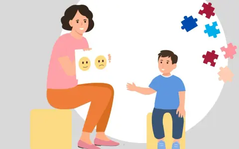 Kobieta z kartką emocji i chłopiec z puzzlami. Dobre rokowania w autyzmie dziecięcym to nadzieja na rozwój.