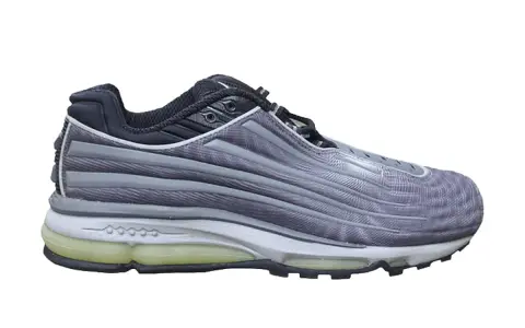 Szary but sportowy Nike Air Max z widoczną poduszką powietrzną. Klasyczne, **nike air max stare modele** w nowoczesnym wydaniu.