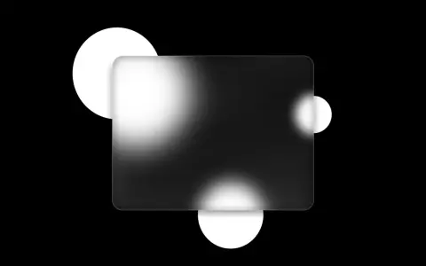 Abstract design with backlit acrylic panels and soft, glowing circles on a black background.