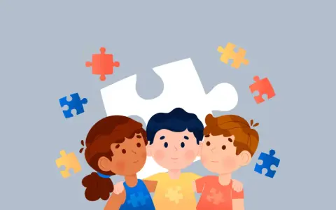 Tres niños se abrazan, rodeados de piezas de rompecabezas. Una guía para como evaluar a un niño con autismo en la escuela.