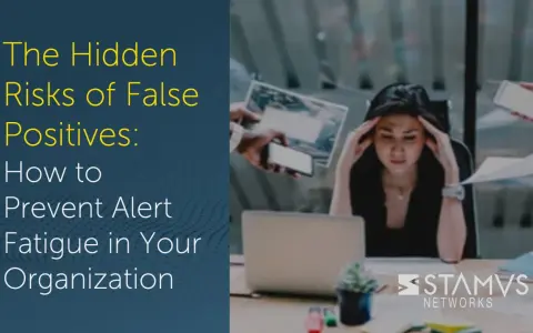 Overwhelmed woman at desk, surrounded by alerts. The image highlights the hidden risks of false positives, showing how they can lead to alert fatigue, impacting true positive detection.