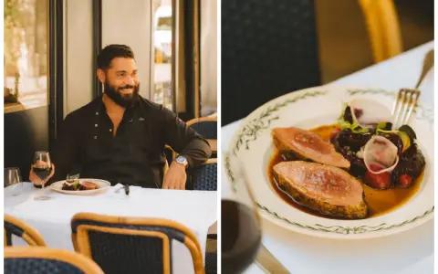 Un chef souriant savoure un plat de nourriture parisienne, un délice de viande et de légumes sur une assiette ornée.