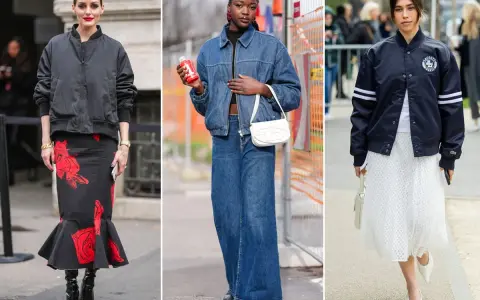 Tre donne sfoggiano il bomber: uno nero con gonna a fiori, uno di jeans con pantaloni ampi, uno blu con gonna bianca. Il bomber significato è un capo versatile.
