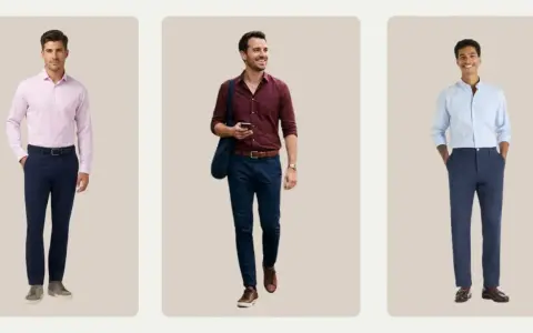 Three men in navy pants. One wears a pink dress shirt, another a burgundy shirt, and the third a light blue shirt.